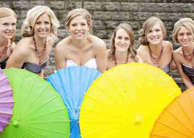 Contemporary Wedding Venues | Bridesmaids Holding Colored Umbrellas