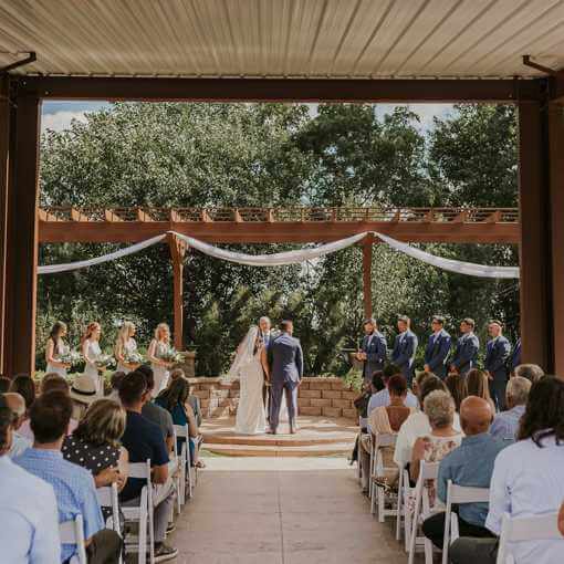 Wedding Couple under a Pavilion at A View on State